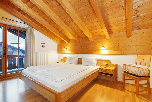 Ferienwohnung Kaiserblick - Schlafzimmer mit Komfortbett